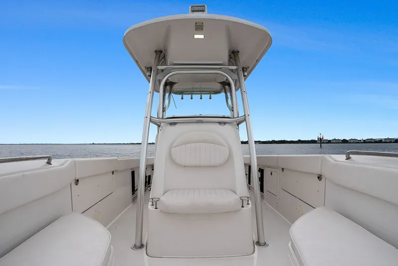 Slide: The Image of 2013 Robalo R260 Center Console on calm waters. - 8