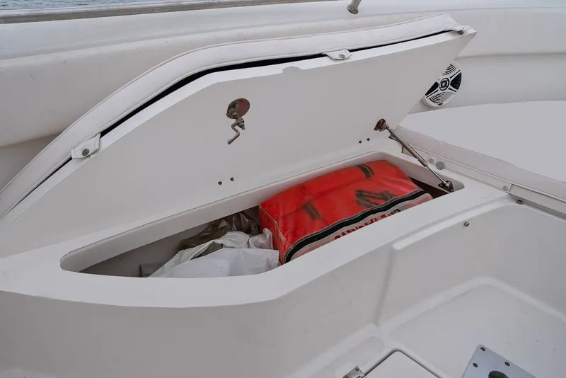 Slide: The Image of Storage compartment in 2013 Robalo R260 Center Console boat. - 9