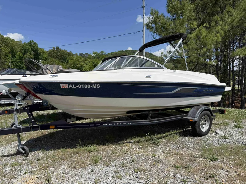 The Image of 2015 Bayliner 185 Bowrider on trailer parked outdoors. - 1