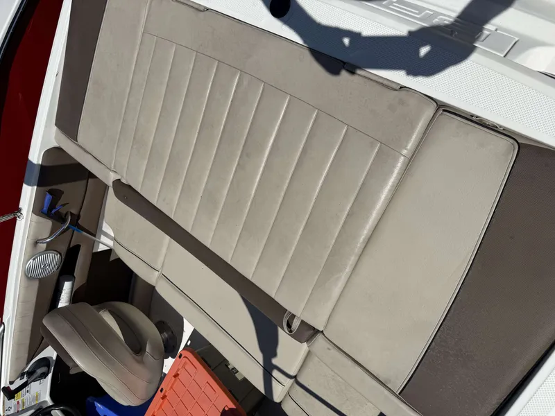 Slide: The Image of Interior of a 2015 Bayliner 185 Bowrider with beige seats. - 10