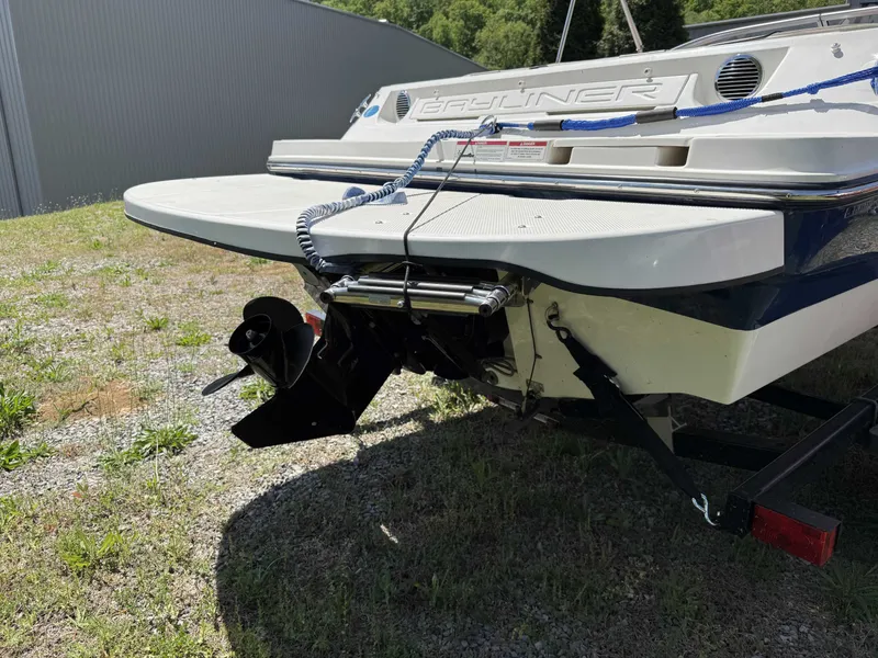 Slide: The Image of Rear view of a 2015 Bayliner 185 Bowrider on a trailer. - 3