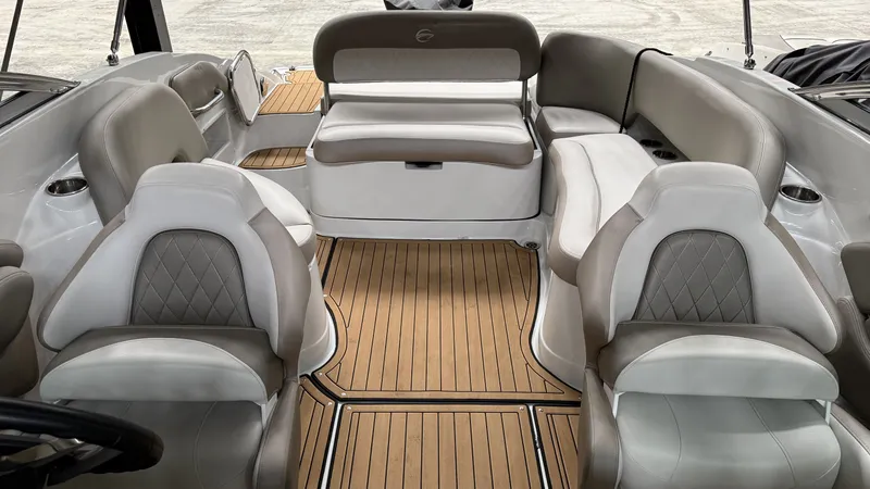 Slide: The Image of Interior of 2022 Crownline Eclipse E255 XS with luxurious seating. - 13