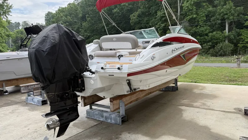 Slide: The Image of 2022 Crownline Eclipse E255 XS boat on a trailer. - 4