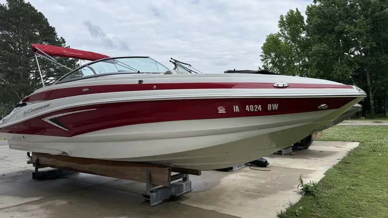 Slide: The Image of 2022 Crownline Eclipse E255 XS boat on a trailer. - 5