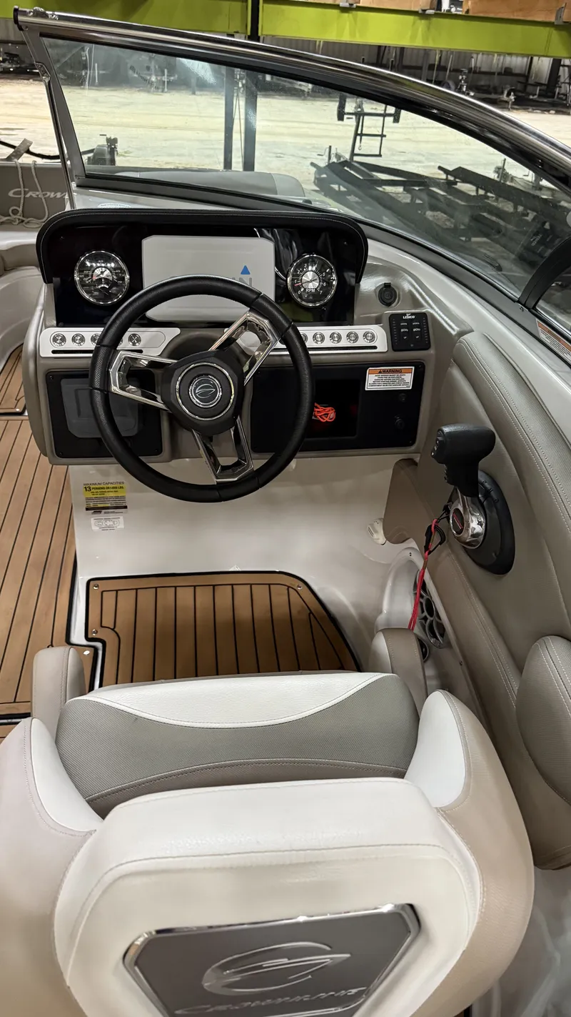 Slide: The Image of Interior view of 2022 Crownline Eclipse E255 XS boat cockpit. - 7