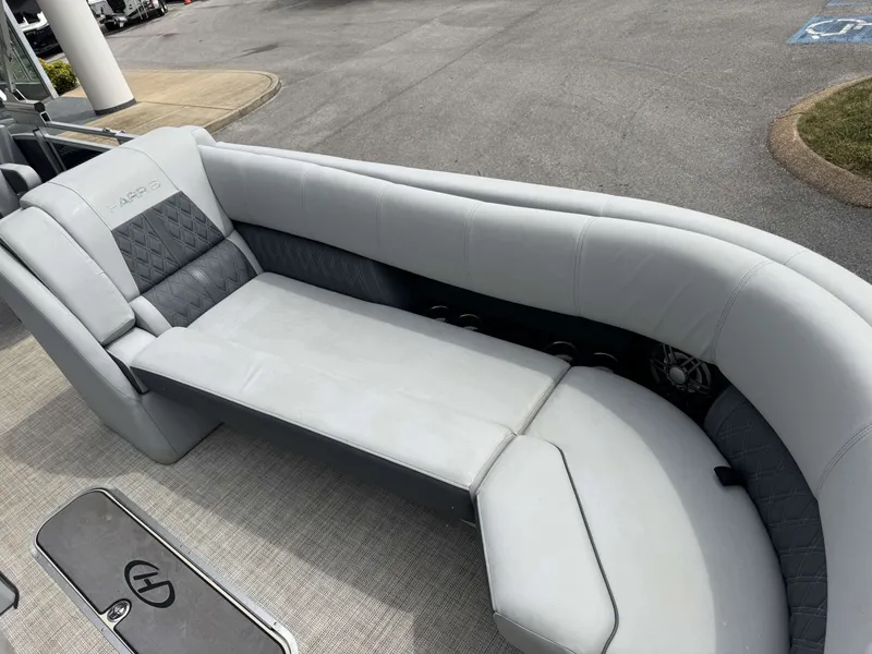 Slide: The Image of Harris Solstice 250 SLDH 2020 boat with luxurious cushioned seating area. - 6