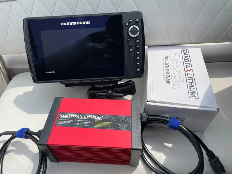 Slide: The Image of Humminbird Helix 8 with Dakota Lithium charger on Heritage Trailer. - 2