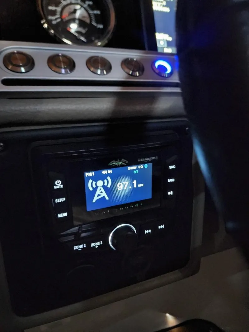 Slide: The Image of Radio display in Heritage Trailer CROWNLINE E255XS 2022, showing 97.1 MHz. - 3