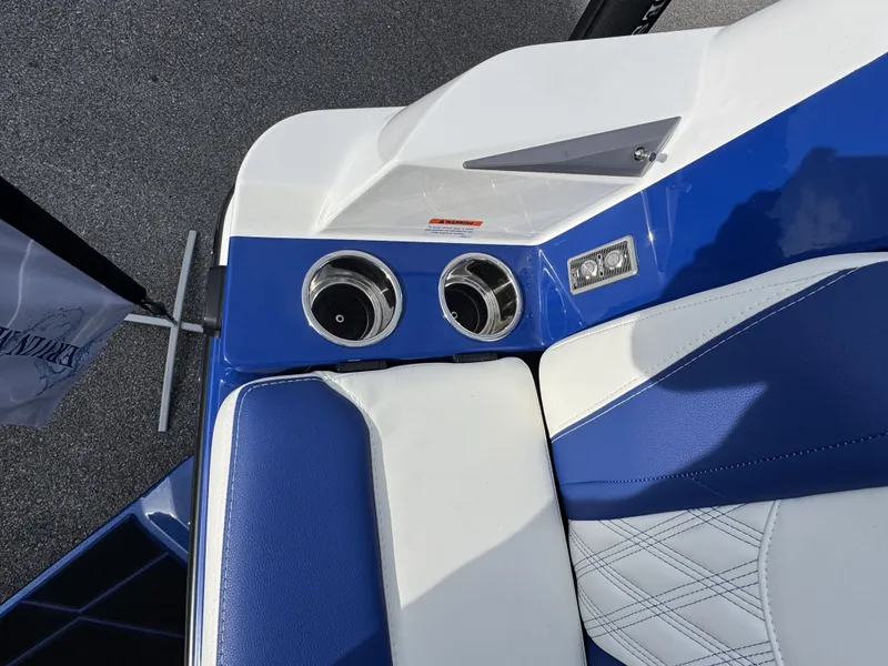 Slide: The Image of Interior of 2025 Malibu M242 with blue and white seating. - 10