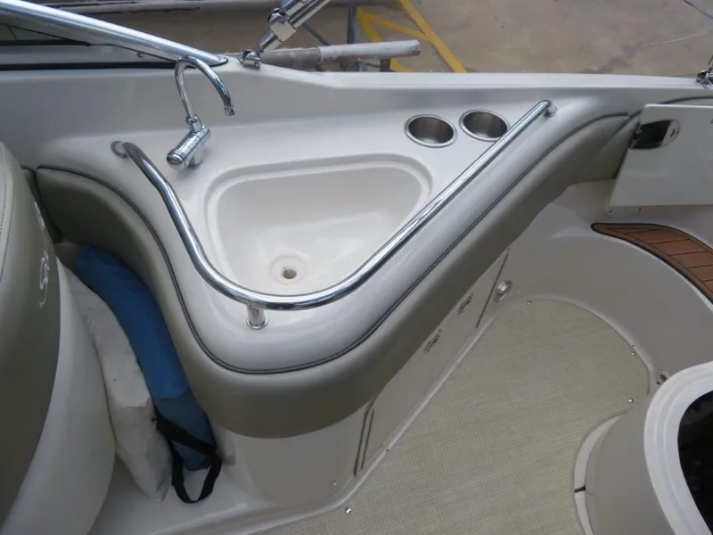 Slide: The Image of Interior of 2006 Sea Ray 240 Sundeck with sink and fixtures. - 7