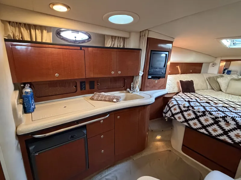 Slide: The Image of Interior of 2003 Sea Ray Sundancer 320 yacht cabin. - 13