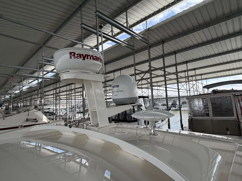 Slide: The Image of 2017 Sea Ray Sundancer 400 with Raymarine equipment in marina. - 15