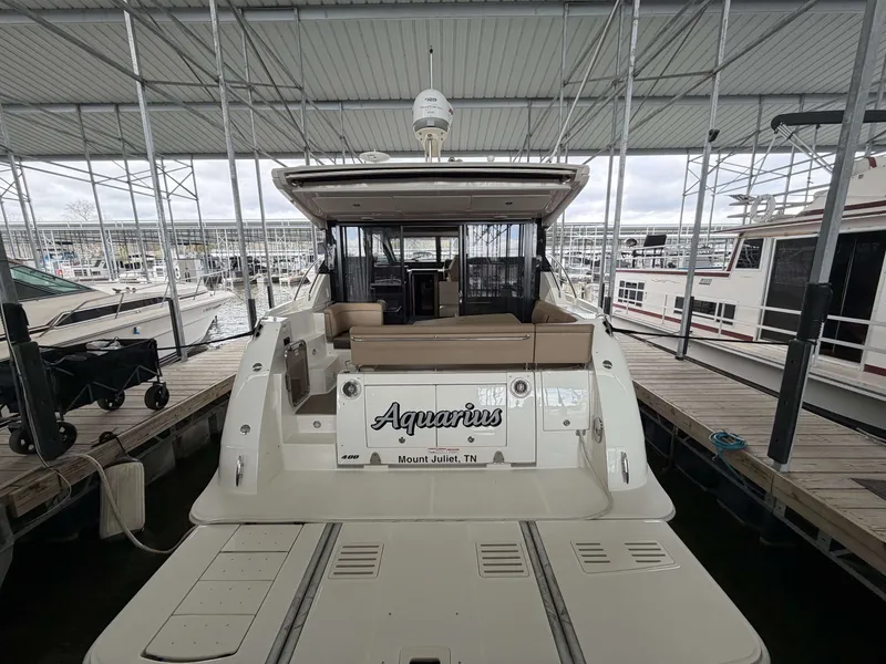 Slide: The Image of 2017 Sea Ray Sundancer 400 yacht docked, rear view. - 29