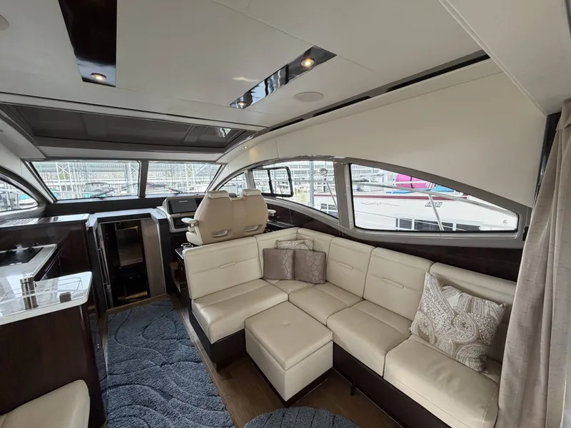 Slide: The Image of Interior of 2017 Sea Ray Sundancer 400 yacht with luxurious seating area. - 44