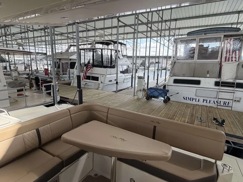Slide: The Image of 2017 Sea Ray Sundancer 400 in a covered marina. - 7