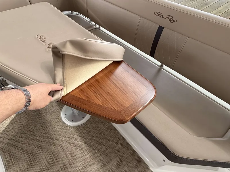 Slide: The Image of Interior of 2017 Sea Ray Sundancer 400 with wooden table and upholstery. - 8