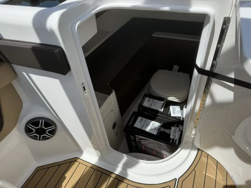 Slide: The Image of Interior of 2026 Sea Ray SDX290 with storage and toilet. - 15