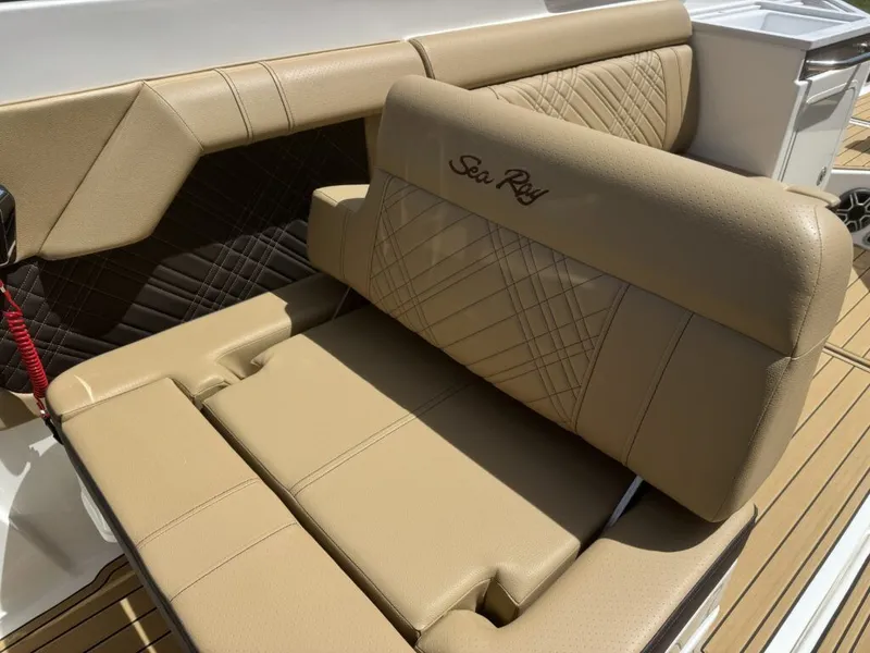 Slide: The Image of Luxurious seating in the 2026 Sea Ray SDX290 boat. - 18