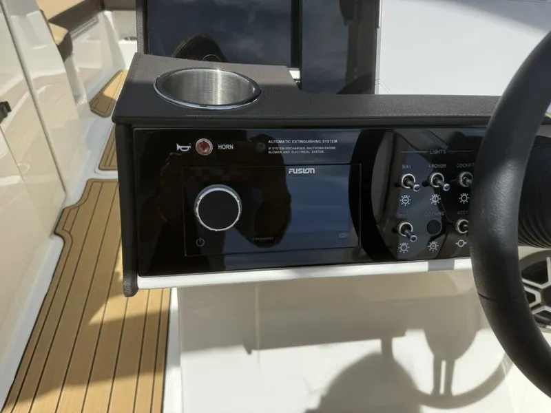 Slide: The Image of Dashboard of 2026 Sea Ray SDX290 with Fusion system. - 21