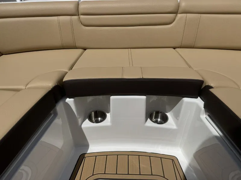 Slide: The Image of Interior of 2026 Sea Ray SDX290 with beige upholstery. - 24