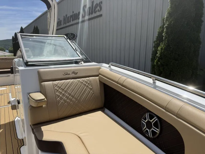 Slide: The Image of Interior of a 2026 Sea Ray SDX290 boat with luxurious seating. - 25