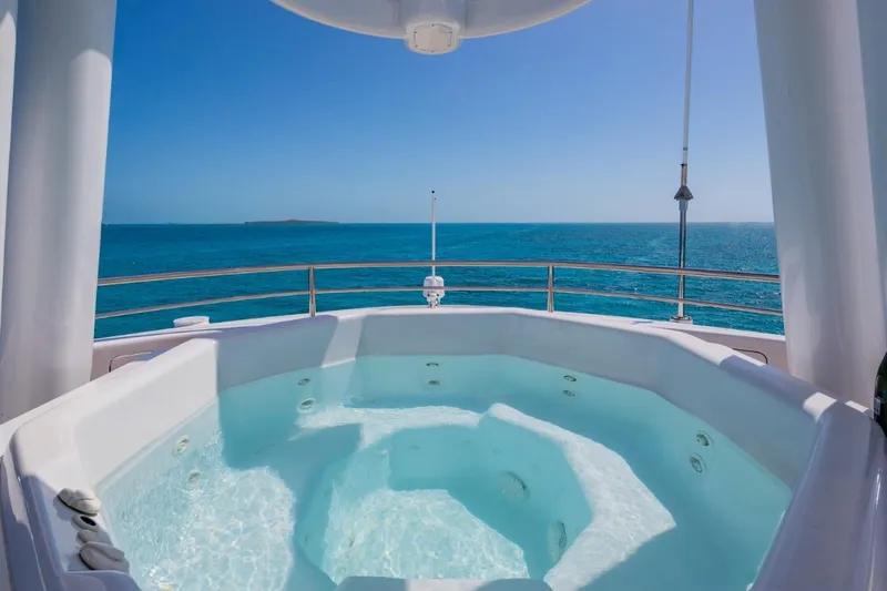 Slide: The Image of Luxurious jacuzzi on Van Mill 143 Tri-Deck Motor Yacht, 1988, with ocean view. - 11