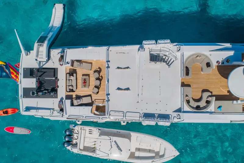 Slide: The Image of Aerial view of 1988 Van Mill 143 Tri-Deck Motor Yacht with luxurious deck and water toys. - 18