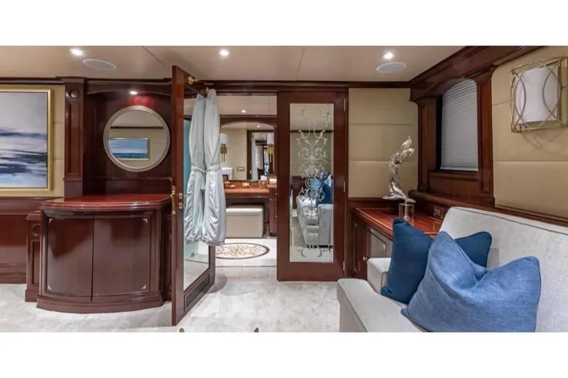 Slide: The Image of Luxurious interior of 1988 Van Mill 143 Tri-Deck Motor Yacht with elegant wood finishes. - 23