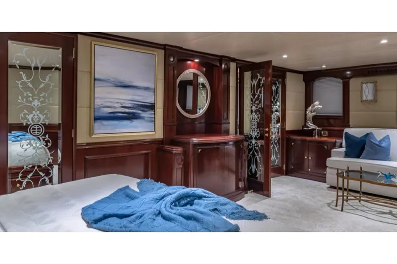 Slide: The Image of Luxurious interior of 1988 Van Mill 143 Tri-Deck Motor Yacht with elegant wood finishes. - 26