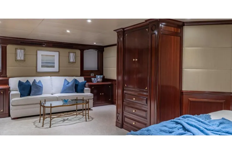 Slide: The Image of Luxurious interior of 1988 Van Mill 143 Tri-Deck Motor Yacht with elegant wood furnishings. - 27