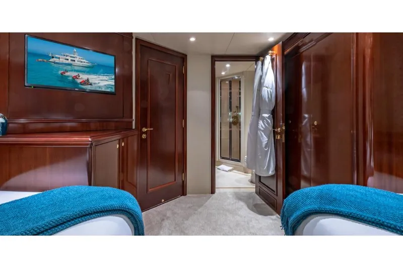 Slide: The Image of Luxurious cabin interior of 1988 Van Mill 143 Tri-Deck Motor Yacht with elegant wood finishes. - 48