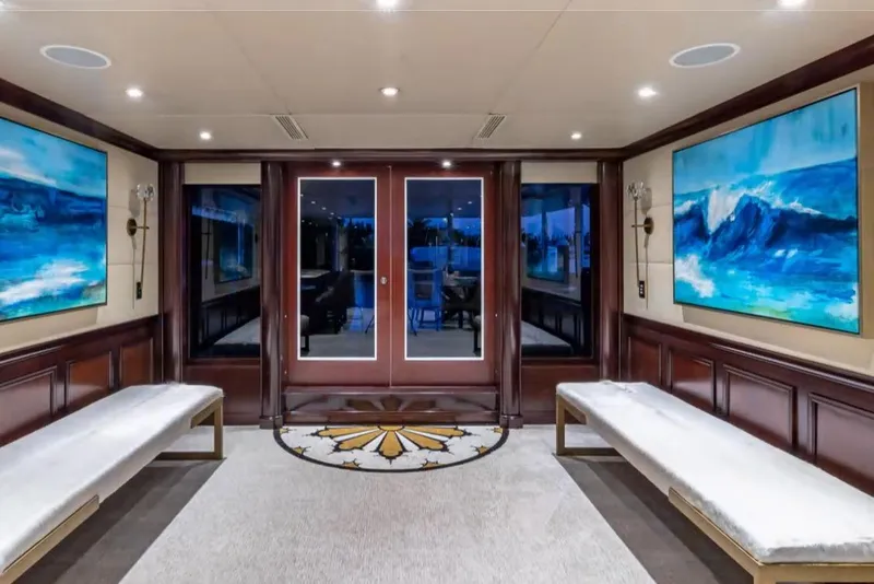 Slide: The Image of Luxurious interior of 1988 Van Mill 143 Tri-Deck Motor Yacht with ocean-themed artwork. - 52