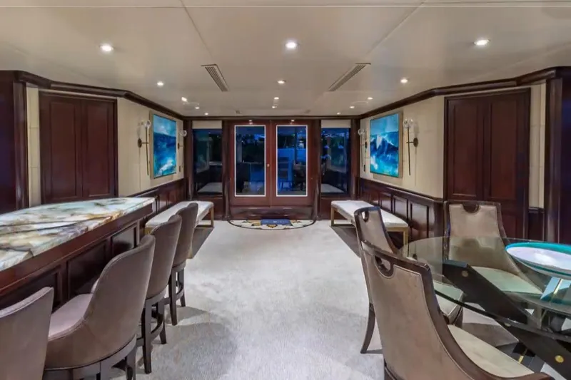 Slide: The Image of Luxurious interior of 1988 Van Mill 143 Tri-Deck Motor Yacht with elegant seating and decor. - 54