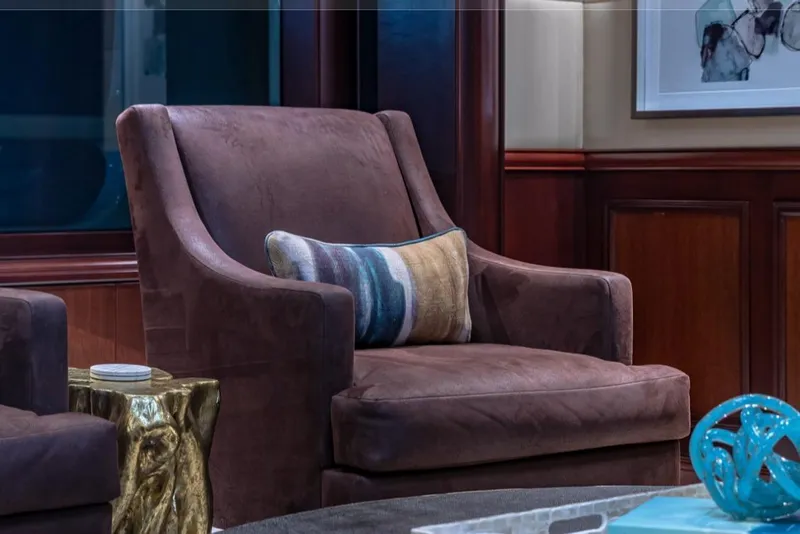 Slide: The Image of Luxurious brown armchair with decorative pillow on Van Mill 143 Tri-Deck Motor Yacht, 1988. - 61