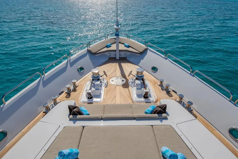 Slide: The Image of Luxurious deck of 1988 Van Mill 143 Tri-Deck Motor Yacht on serene blue waters. - 7