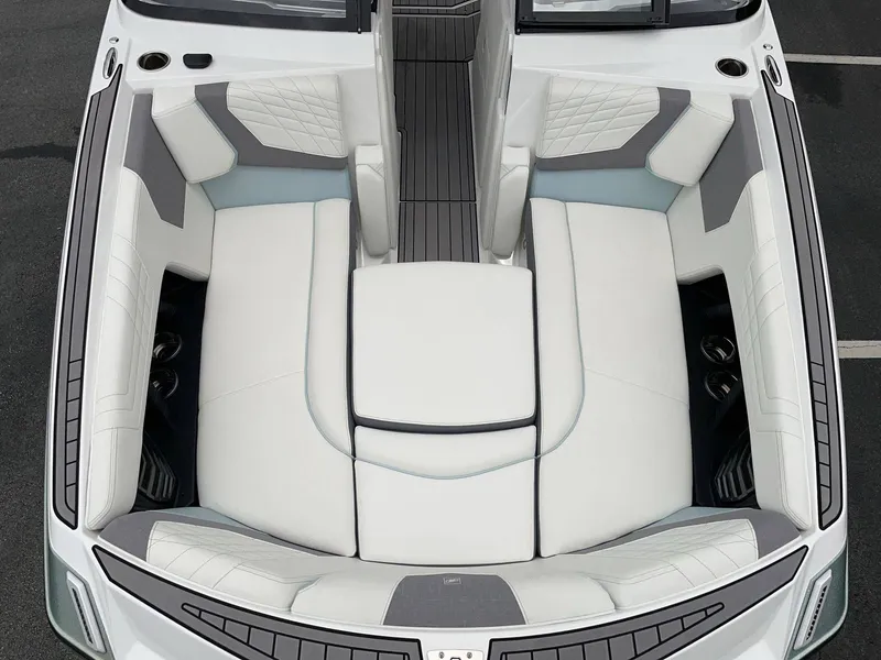 Slide: The Image of Interior of 2022 Nautique G25 with luxurious white seating. - 30