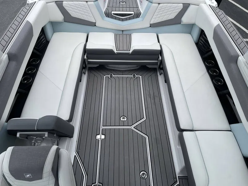 Slide: The Image of 2022 Nautique G25 interior with luxurious seating. - 5