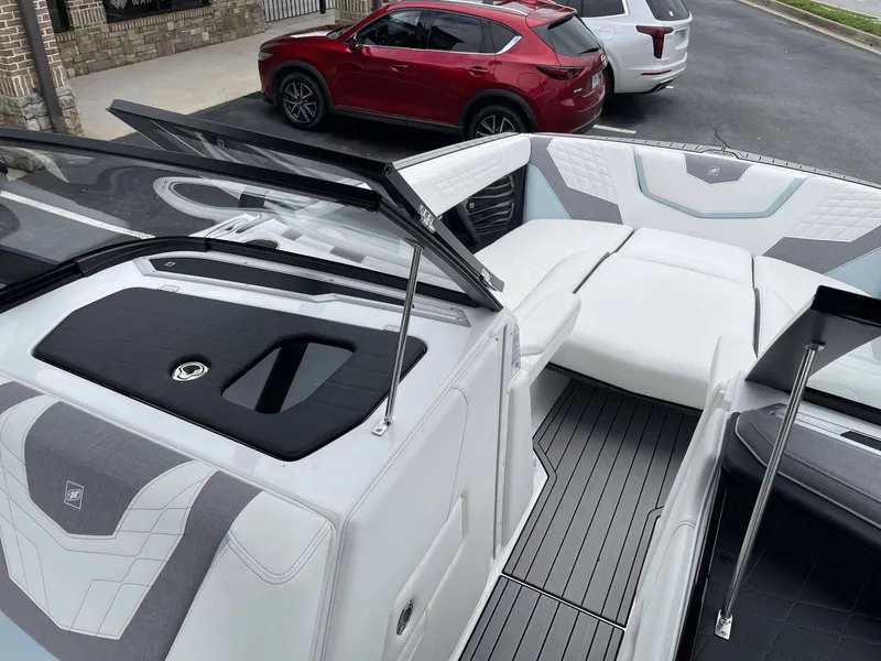 Slide: The Image of Interior of a 2022 Nautique G25 boat, luxurious design. - 7