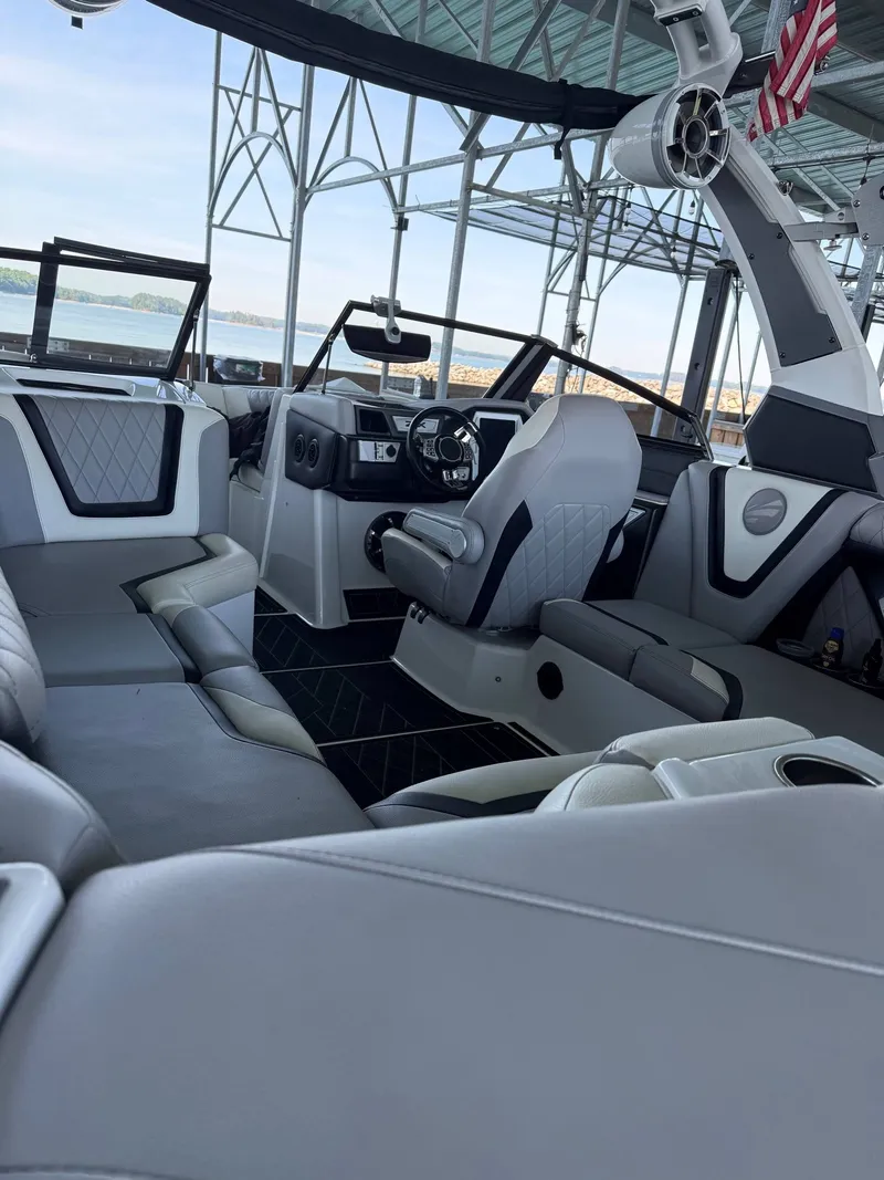 Slide: The Image of Interior of a 2019 Tigé ZX1 boat with luxurious seating. - 3