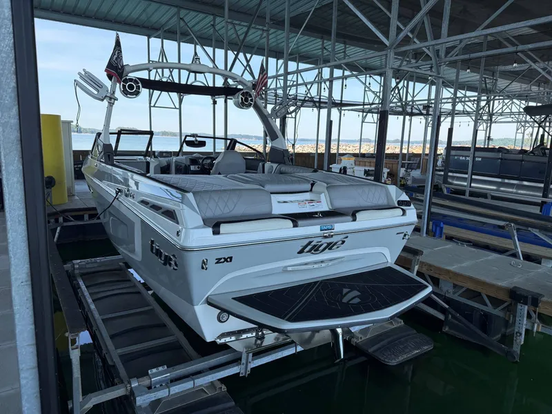 Slide: The Image of 2019 Tigé ZX1 boat in a covered dock. - 6