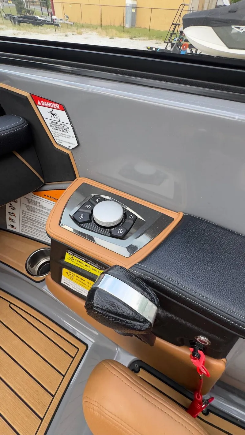 Slide: The Image of Control console of 2022 Nautique Super Air Nautique GS20 boat. - 11