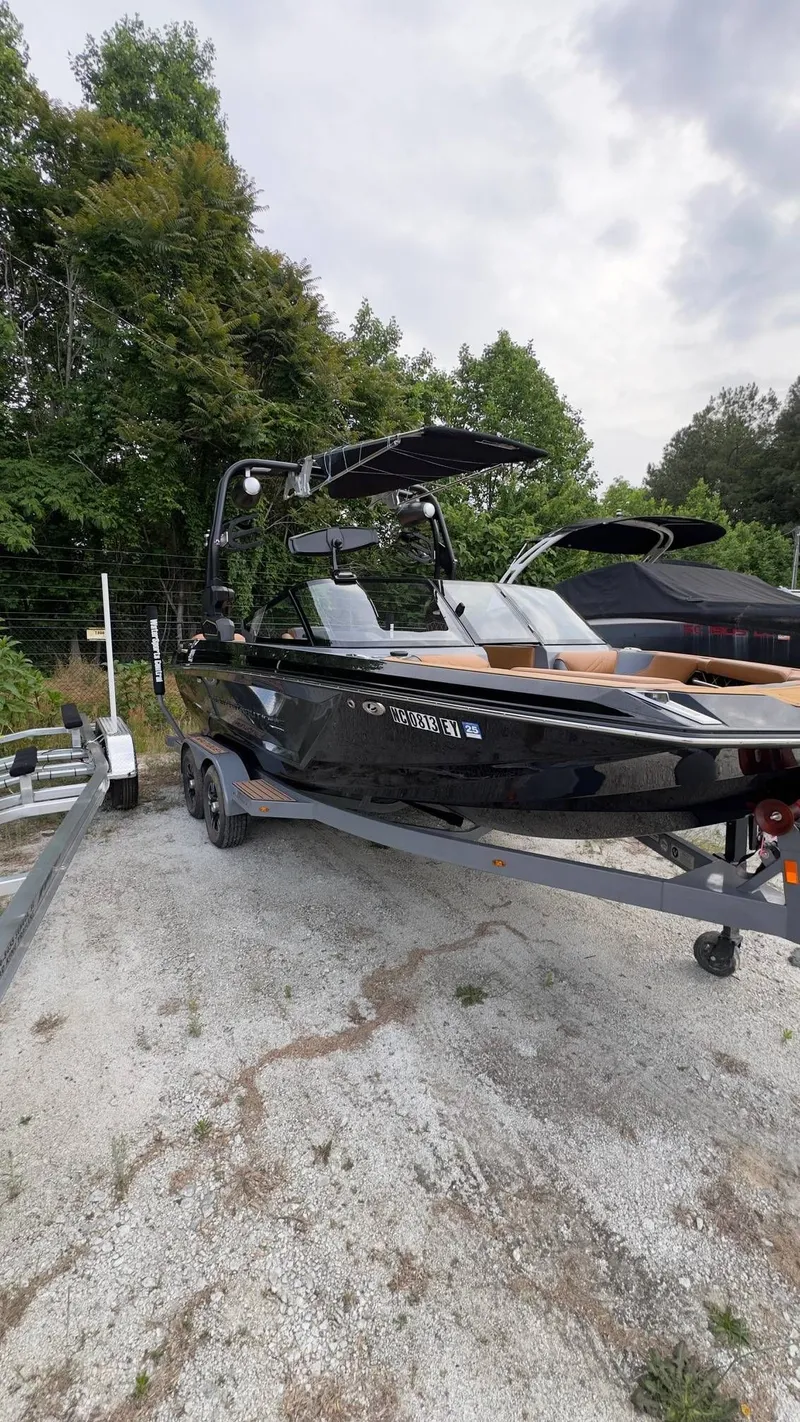 Slide: The Image of 2022 Nautique Super Air Nautique GS20 on trailer outdoors. - 3