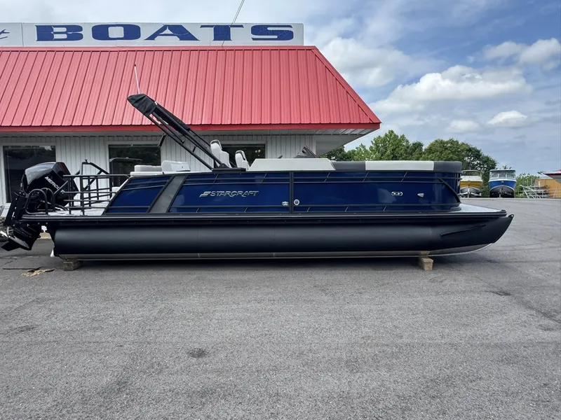 The Image of 2026 Starcraft SLS-5 Q DH pontoon boat in front of boat building. - 1