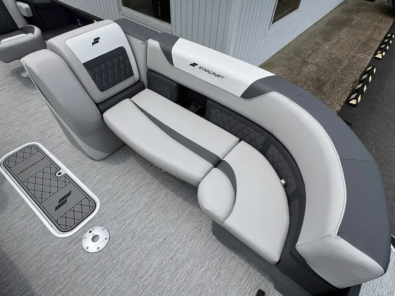 Slide: The Image of Starcraft SLS-5 Q DH 2026 boat seating with gray upholstery. - 12