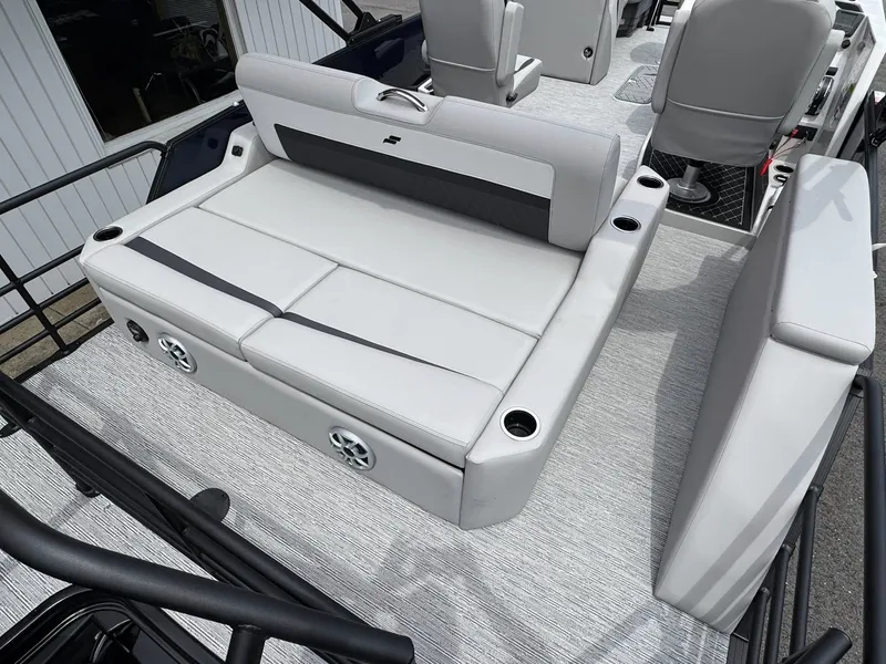 Slide: The Image of 2026 Starcraft SLS-5 Q DH boat with gray seating and cup holders. - 14