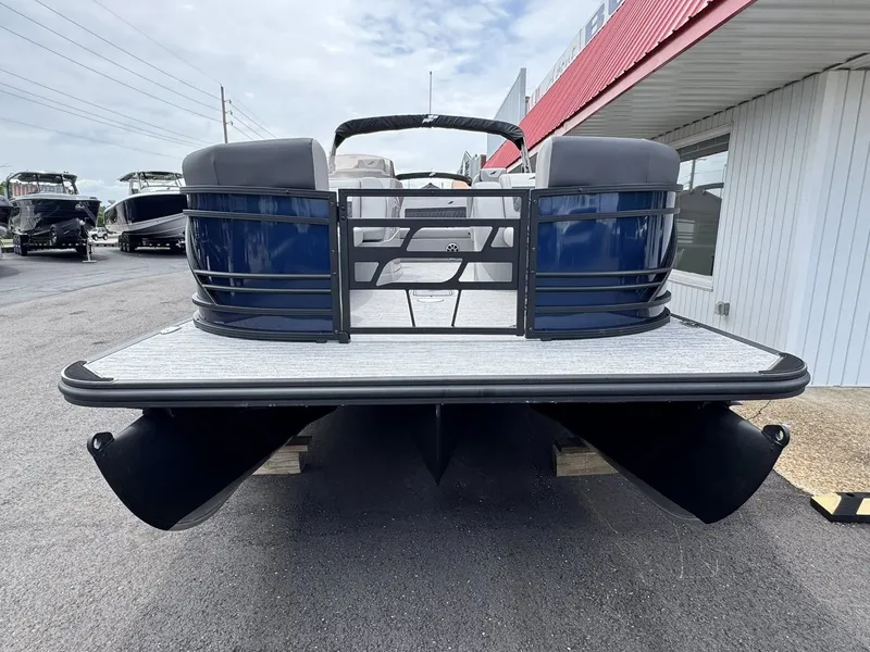 Slide: The Image of 2026 Starcraft SLS-5 Q DH pontoon boat in parking lot. - 29