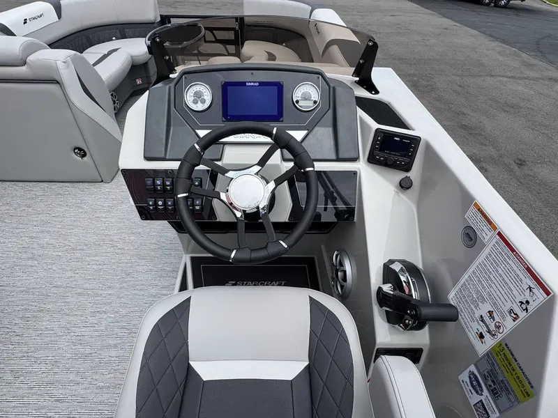 Slide: The Image of Interior of 2026 Starcraft SLS-5 Q DH with modern helm station. - 31