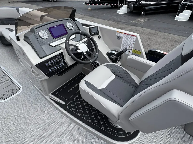 Slide: The Image of Interior of 2026 Starcraft SLS-5 Q DH with modern helm station. - 6