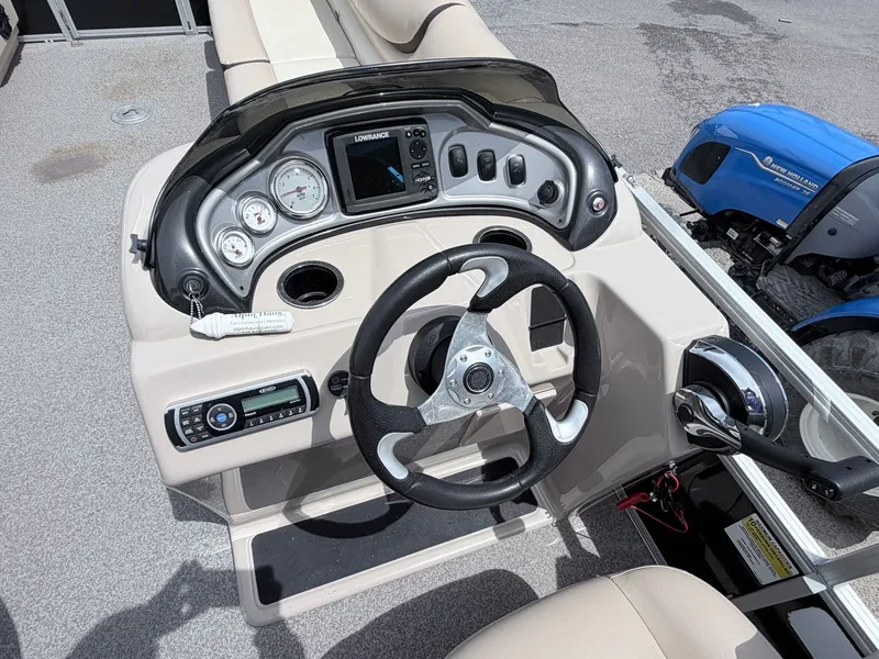 Slide: The Image of Helm console of a 2016 Sun Tracker Party Barge 22 DLX pontoon boat. - 12