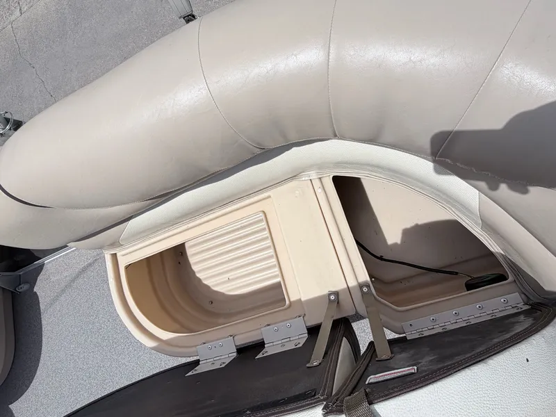 Slide: The Image of Seat storage compartment on 2016 Sun Tracker Party Barge 22 DLX. - 15